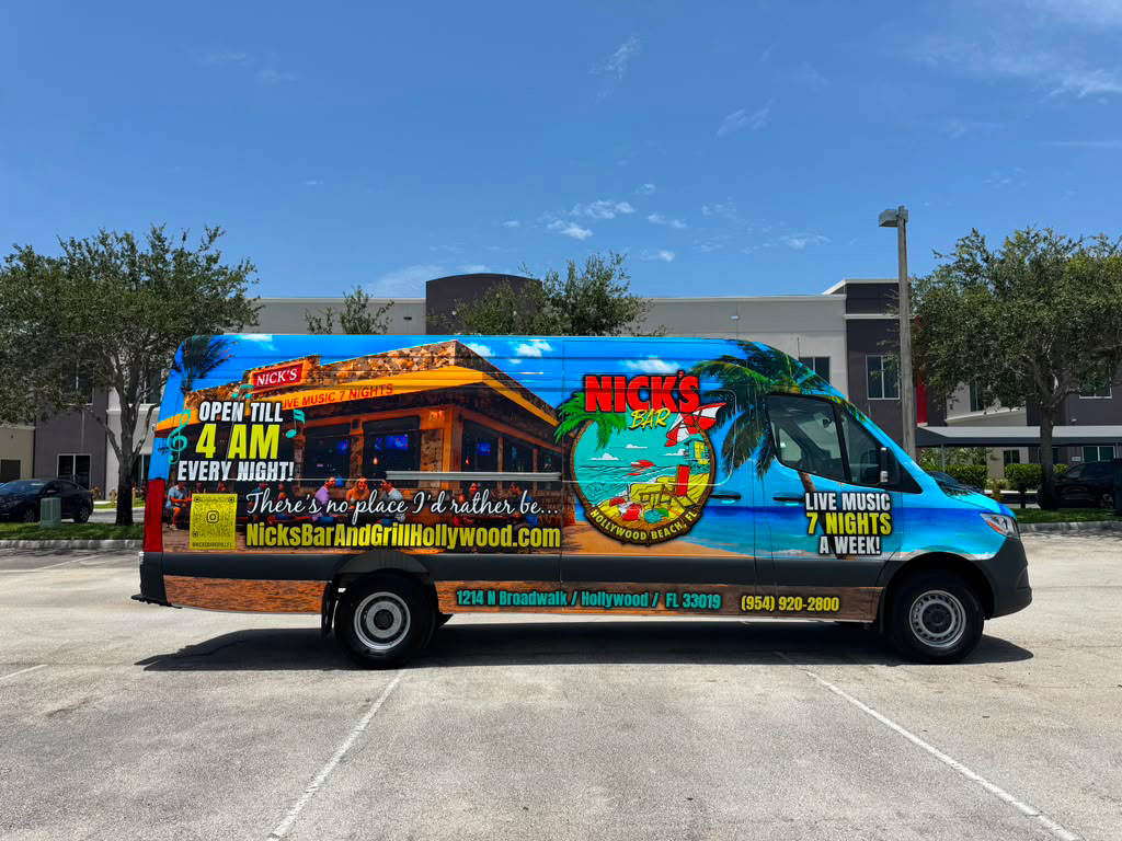 Promotional van for Nick's Bar & Grill on Hollywood Beach, bright blue with palm tree art and text about 4 AM open and live music glasses of slogans about late-night hours (promotional vehicle).